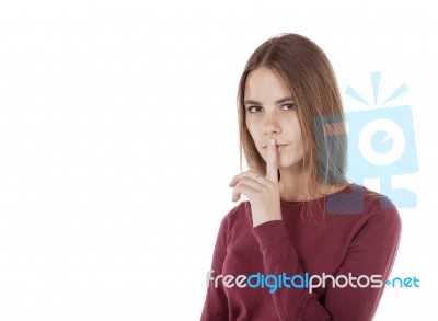 Girl Shows A Sign Quietly Stock Photo