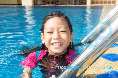 Girl Side Of Swimming Pool Stock Photo