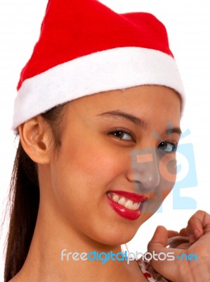 Girl Wearing Christmas Hat Stock Photo