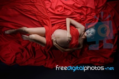 Glamour And Style Of Beautiful Young Asian Pregnant Woman Laying… Stock Photo