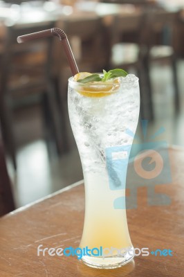 Glass Of Iced Honey Lemon Soda Stock Photo
