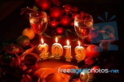 Glasses Of Champagne And New Year Decorations Stock Photo