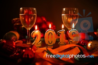 Glasses Of Champagne And New Year Decorations Stock Photo