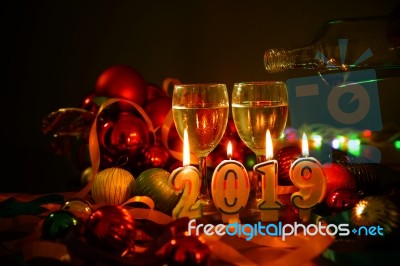 Glasses Of Champagne And New Year Decorations Stock Photo