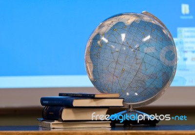 Globe And Books On Table Stock Photo
