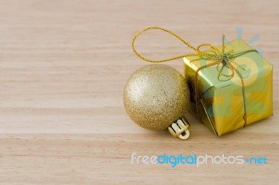 Gold Christmas Bauble And Present Box Stock Photo