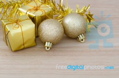 Gold Christmas Bauble And Two Present Boxes Stock Photo