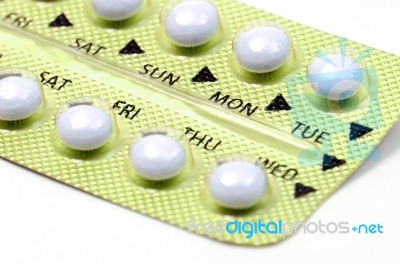 Gold Strip Of Contraceptive Pill With English Instructions Closed-up On White Background Stock Photo