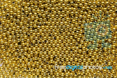 Golden Bead Background Stock Photo
