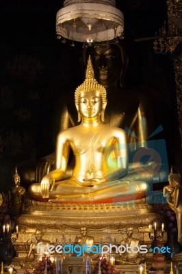 Golden Buddha Statue In The Church Stock Photo