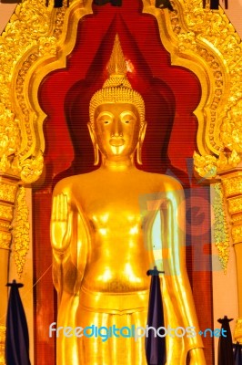 Golden Buddha Statue In The Church Stock Photo