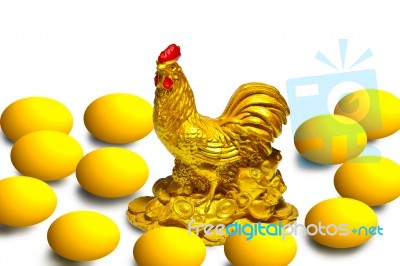 Golden Chicken And Egg Stock Image