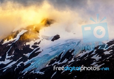 Golden Glow On Top Of The Mountain Stock Photo
