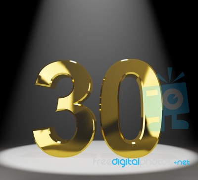 Golden Number 30 With Spotlit Stock Image