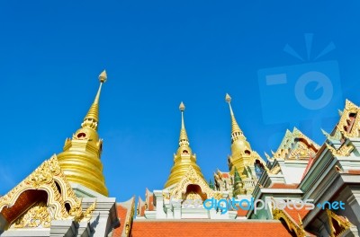 Golden Pinnacle Of Thai Temple Stock Photo