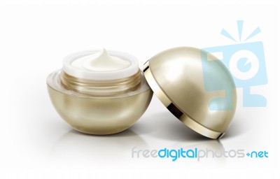 Golden Sphere Cosmetic Jar On White Background Stock Photo