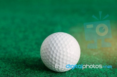 Golf On Green Lawn Stock Photo