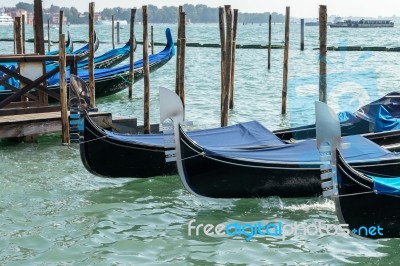 Gondolas Moored At The Entrance To The Grand Canal Stock Photo