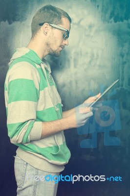 Good Looking Smart Geek Man With Tablet Computer Stock Photo