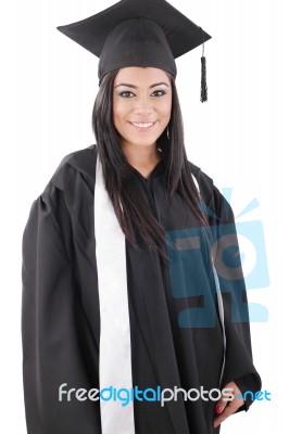 Graduation Of A Woman Dressed In A Black Gown Stock Photo