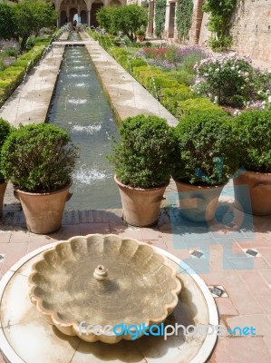 Granada, Andalucia/spain - May 7 : View Of A Fountain In The Alh… Stock Photo