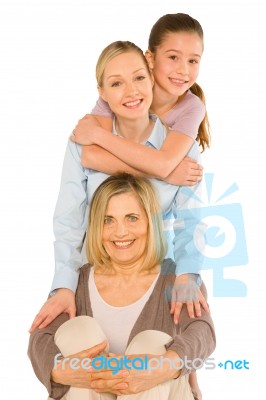 Granddaughter Grandmother Young Mother Sat On White Background Stock Photo
