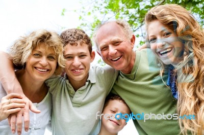 Grandparents Having Good Time With Grandchildren Stock Photo