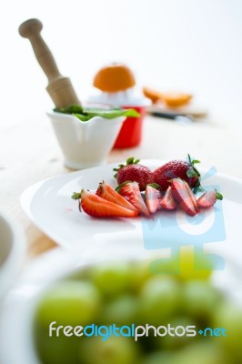Grapes, Strawberries, Mint And Orange Stock Photo