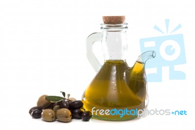 Green And Black Olives With Olive Oil Bottle Stock Photo