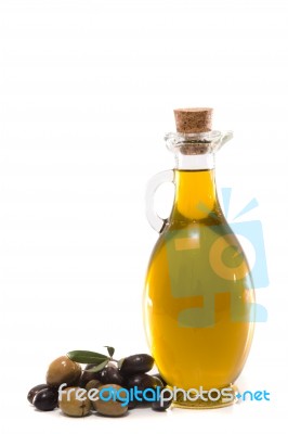 Green And Black Olives With Olive Oil Bottle Stock Photo