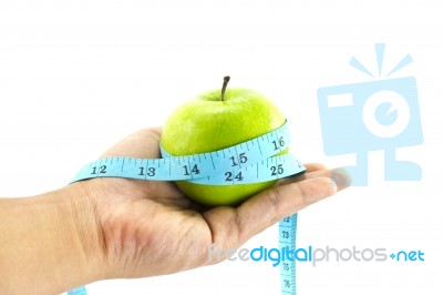 Green Apple With Tape Stock Photo Green Apple With Tape Stock Photo