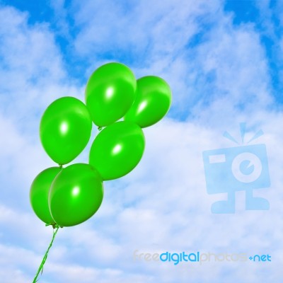 Green Balloons On The Sky Background Stock Photo