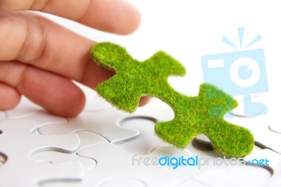 Green Puzzle Piece, Stock Photo