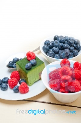 Green Tea Matcha Mousse Cake With Berries Stock Photo