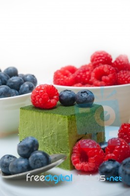 Green Tea Matcha Mousse Cake With Berries Stock Photo