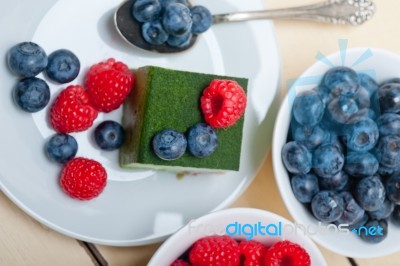 Green Tea Matcha Mousse Cake With Berries Stock Photo