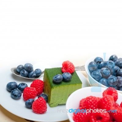 Green Tea Matcha Mousse Cake With Berries Stock Photo