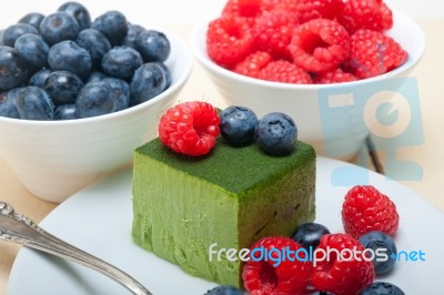 Green Tea Matcha Mousse Cake With Berries Stock Photo