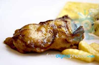Grilled Chicken With Fries Stock Photo