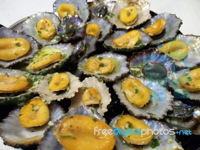 Grilled Limpets Meal With Lemon Stock Photo