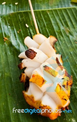 Grilled Squid On Banana Leaves Stock Photo