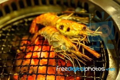Grilling Prawn On Grill Stock Photo