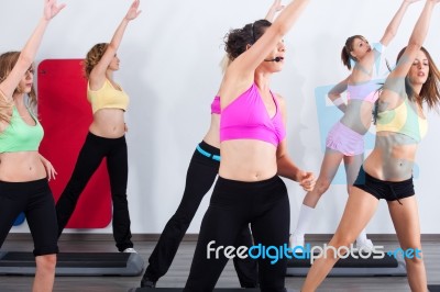 Group Of Gym People In An Aerobics Class Stock Photo