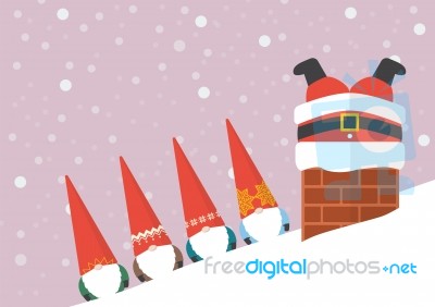 Group Of Little Santa Looking At Big Santa Stuck In Chimney Stock Image