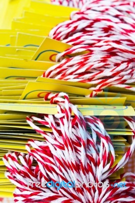 Group Of White And Red Ropes With Yellow Cards Stock Photo