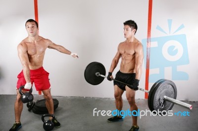 Group With Dumbbell Weight Training Equipment On Sport Gym Stock Photo