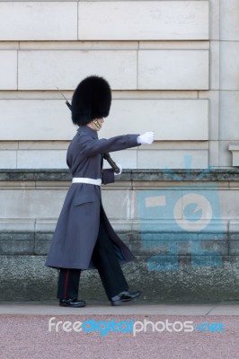 Guard In Greatcoat Parading At Buckingham Palace Stock Photo