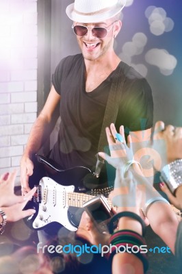 Guitarist Performing For His Fans Stock Photo