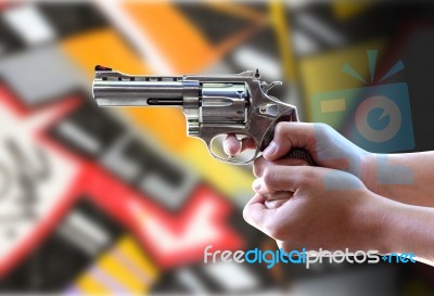 Gun In Hand Stock Photo