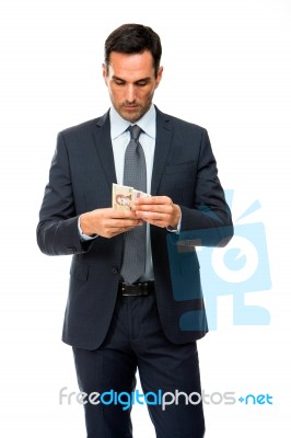 Half Length Portrait Of A Businessman Counting Money Stock Photo Half Length Portrait Of A Businessman Counting Money Stock Photo